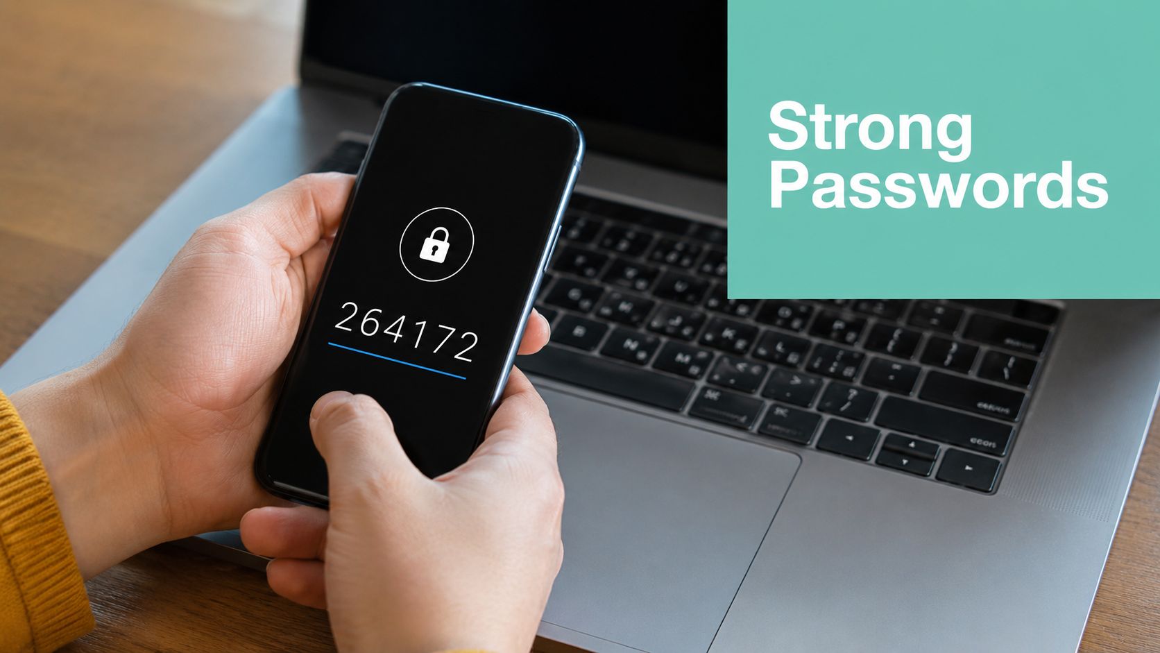 Safeguard Your Business: Email Security Best Practices 2 A person holds a smartphone displaying a security code and a lock icon over a laptop.