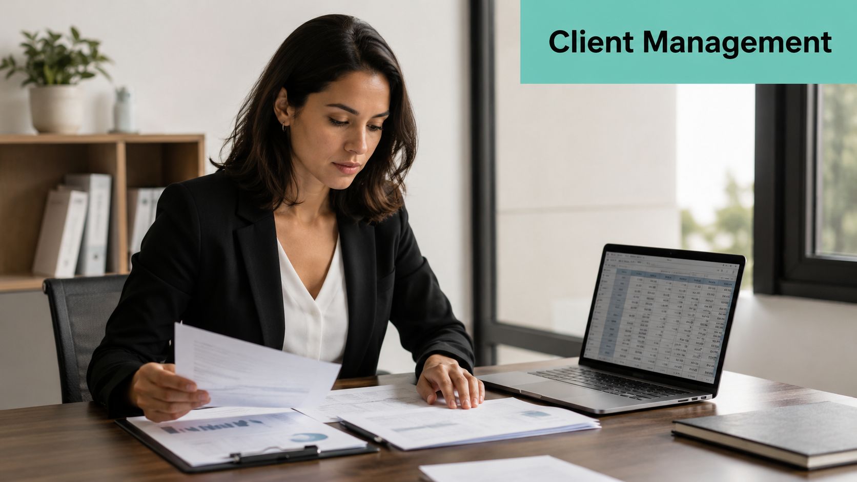 How to Manage Multiple Websites: An Aussie Agency Guide 6 A professional woman sitting at a desk reviewing financial documents for effective client management tasks.