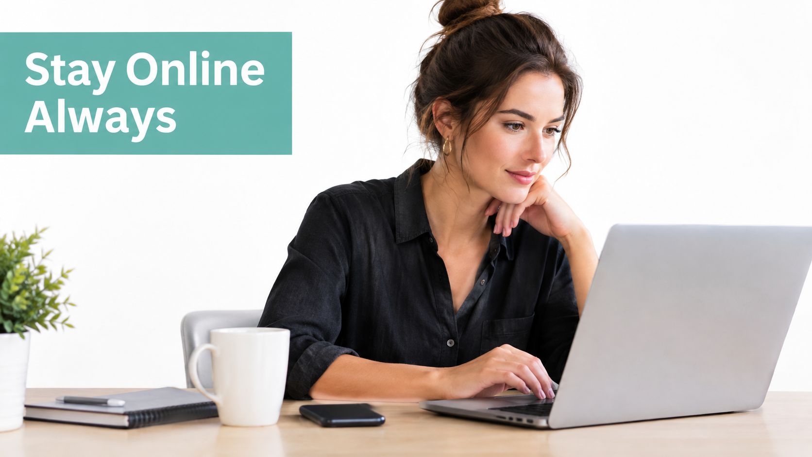 What Is Cloud Hosting and How It Works in Australia 1 A woman working on a laptop at her desk next to a coffee mug and notebook.